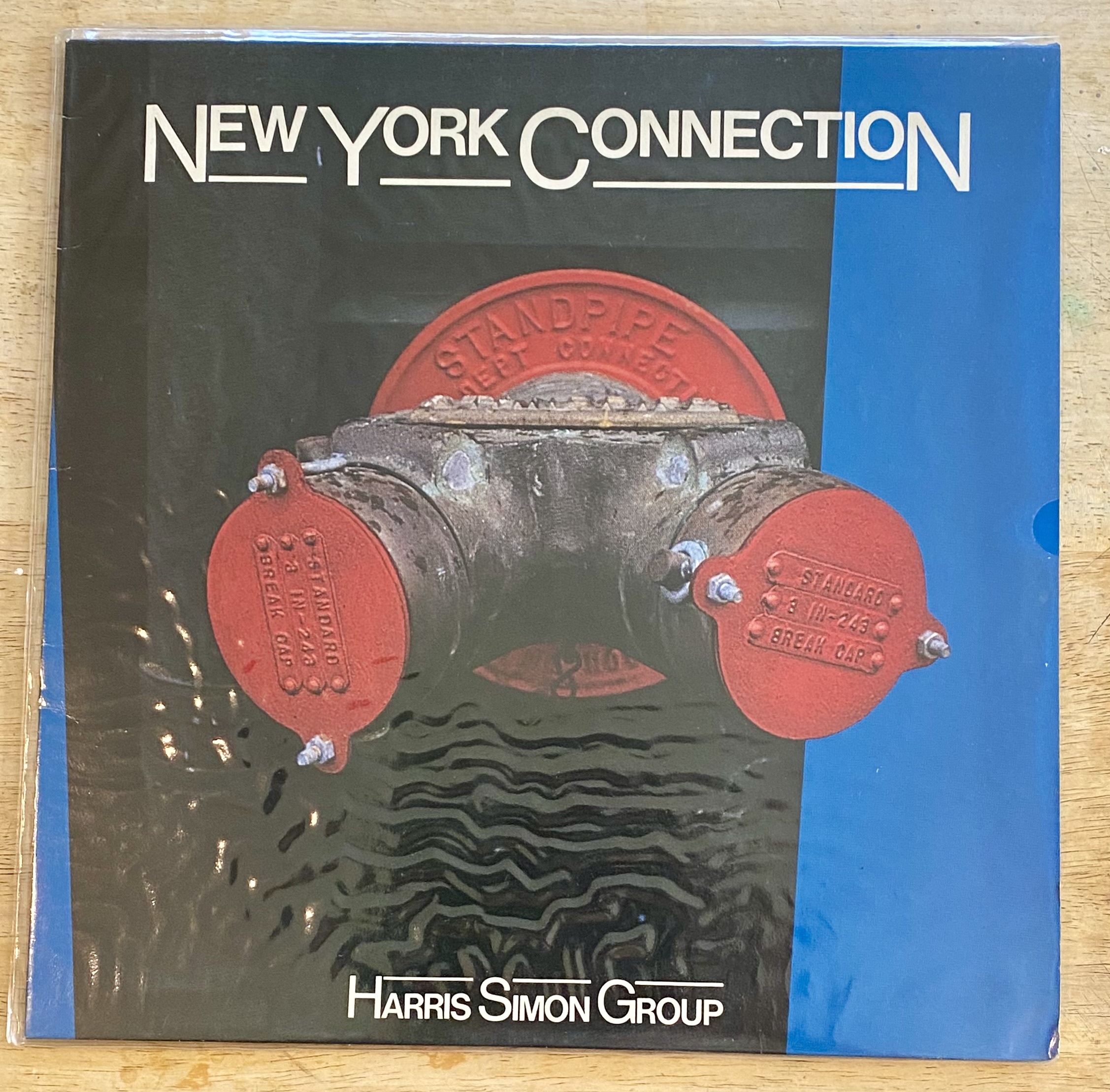 Lot 141: Harris Simon Group – New York Connection Vinyl LP (1984 UK Pressing, Eastwind EWIND 701) EX/VG+
