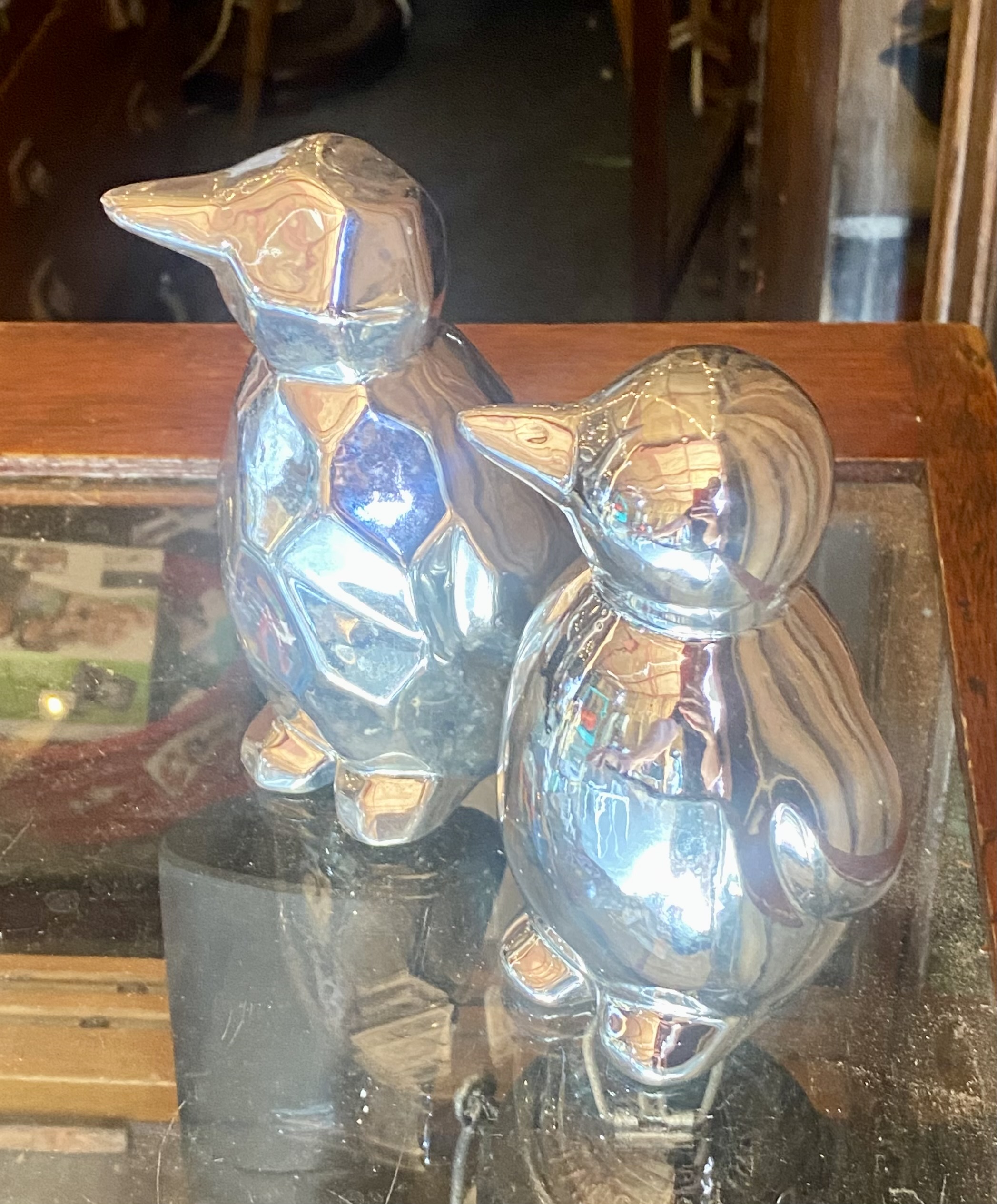 Lot 241: Pair of Modern Silver Chrome Ceramic Penguin Ornaments (15cm)