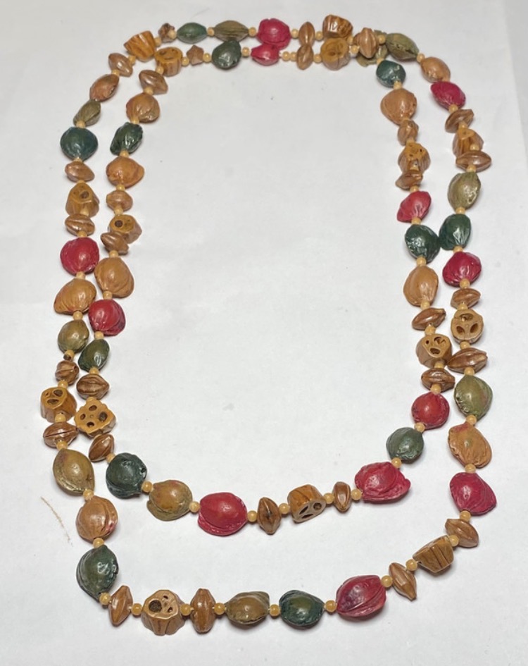 Lot 154: Vintage 1970s Tropical Seed & "Monkey Face" Statement Necklace