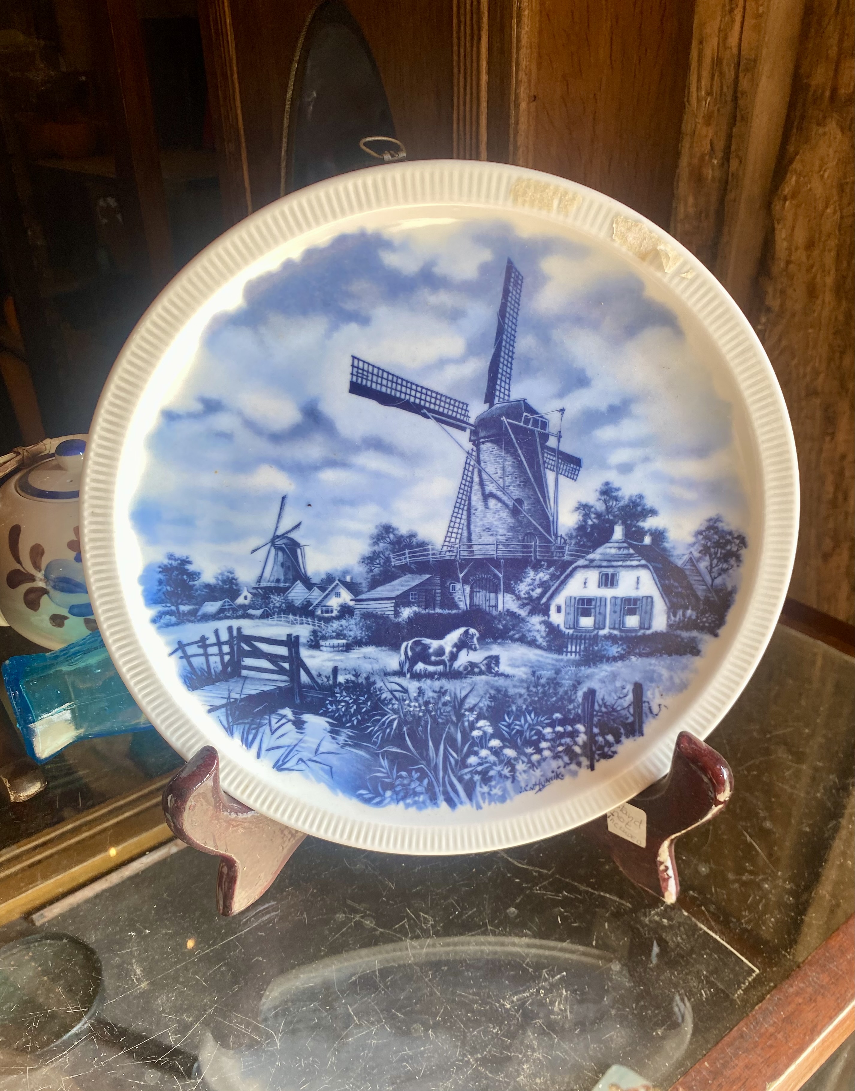 Lot 244: Vintage Dutch Delft Blauw Wall Plate by J. C. van Hunnik – Windmill & Countryside (~26cm / 10")